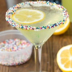 Lemon cupcake martini with rainbow sprinkles on rim