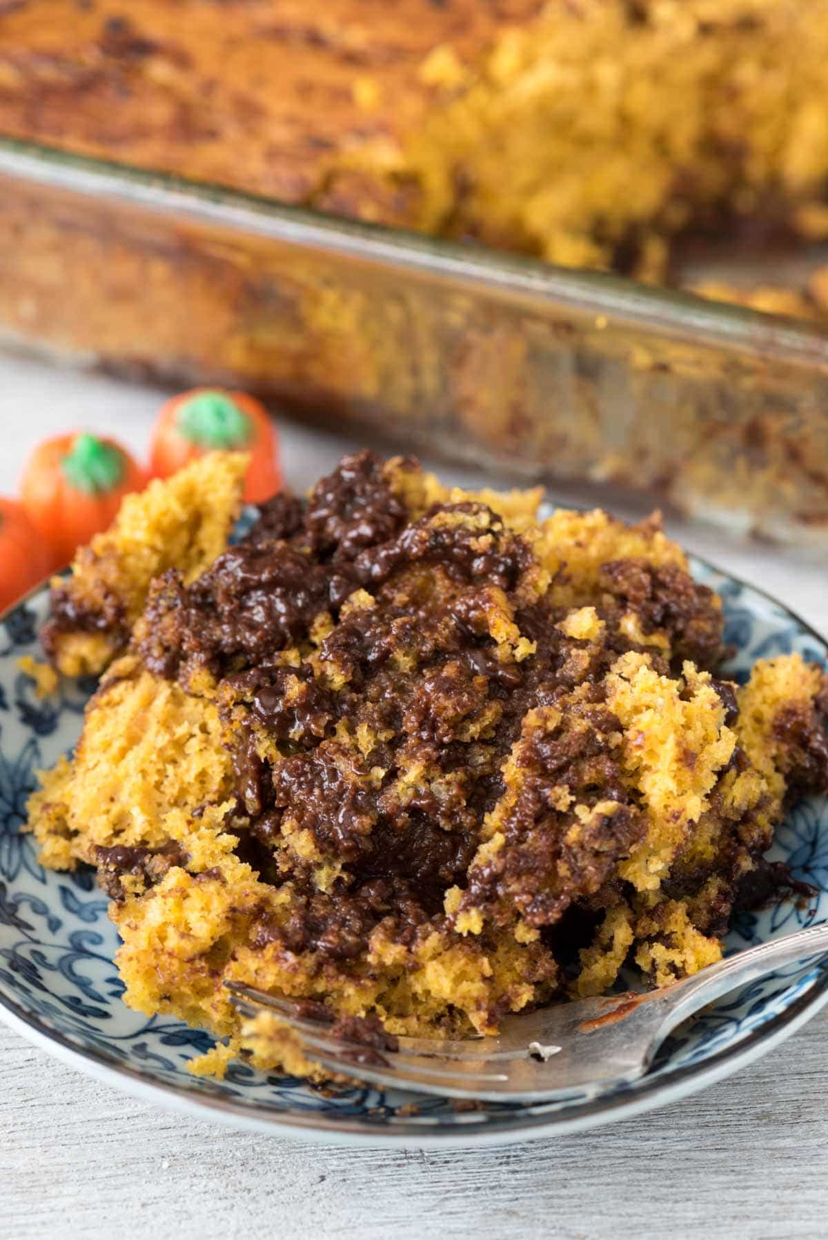 Pumpkin Hot Fudge Pudding Cake - this easy pumpkin cake recipe starts with a cake mix and is baked with chocolate that turns into hot fudge pudding!