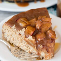 slice of caramel apple cheesecake on white plate