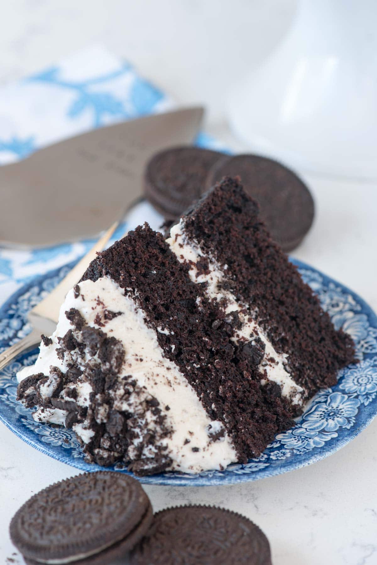 Extreme Cookies 'n Cream Cake - this cake tastes like an Oreo cookie! Dark chocolate cake layers sandwiched with a marshmallow buttercream frosting and lots of crushed Oreo cookies. I made two of these in two days!