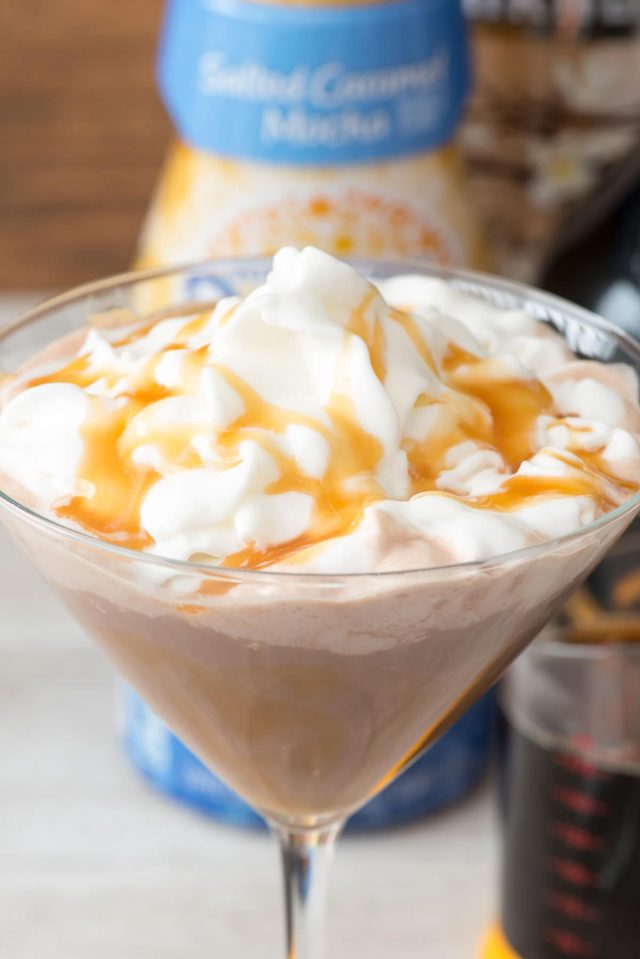 Salted Caramel Mocha Martini drizzled with caramel and whipped cream.
