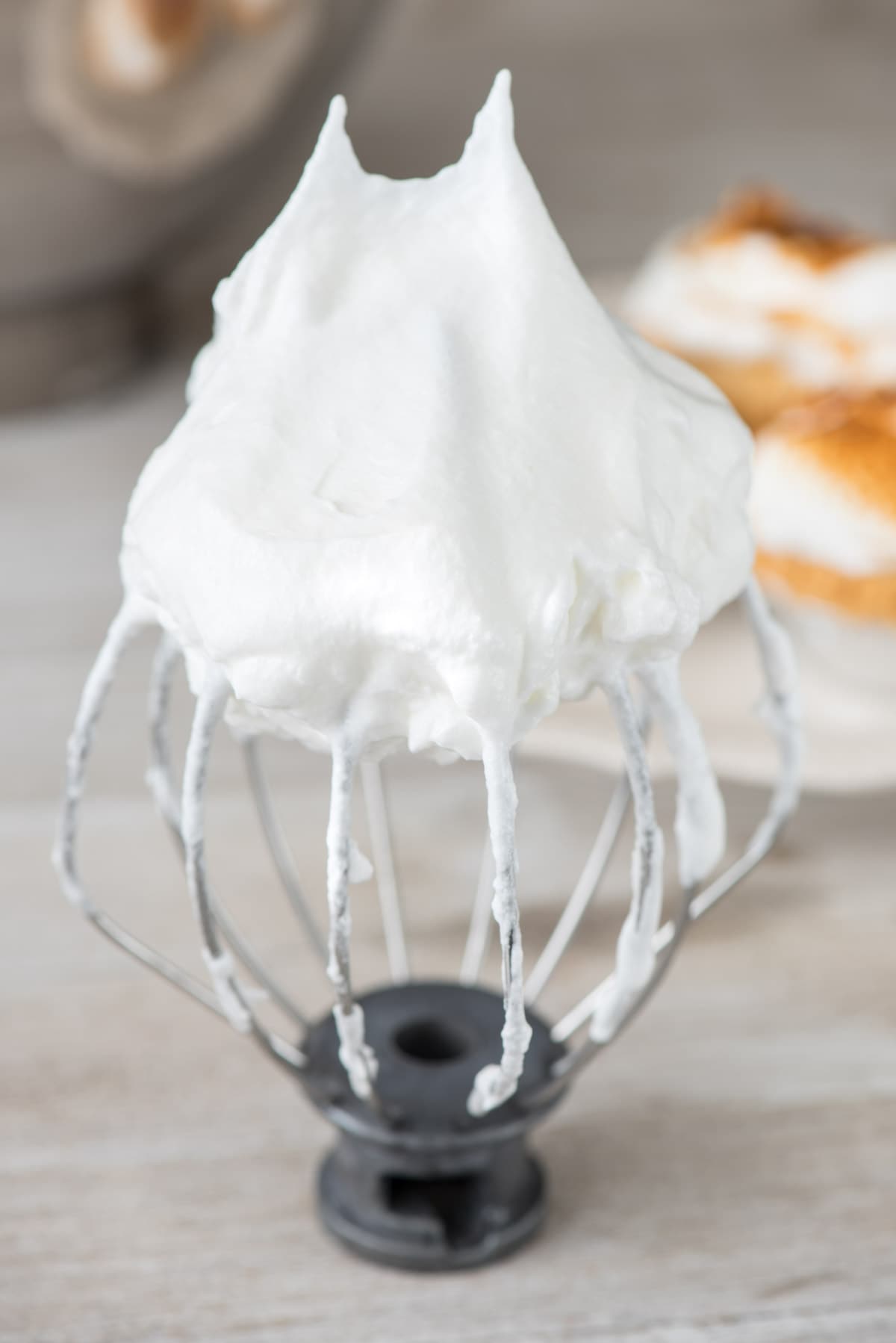 Easy Marshmallow Meringue Frosting - this meringue is so much better than a traditional baked one! It takes like a melted marshmallow!