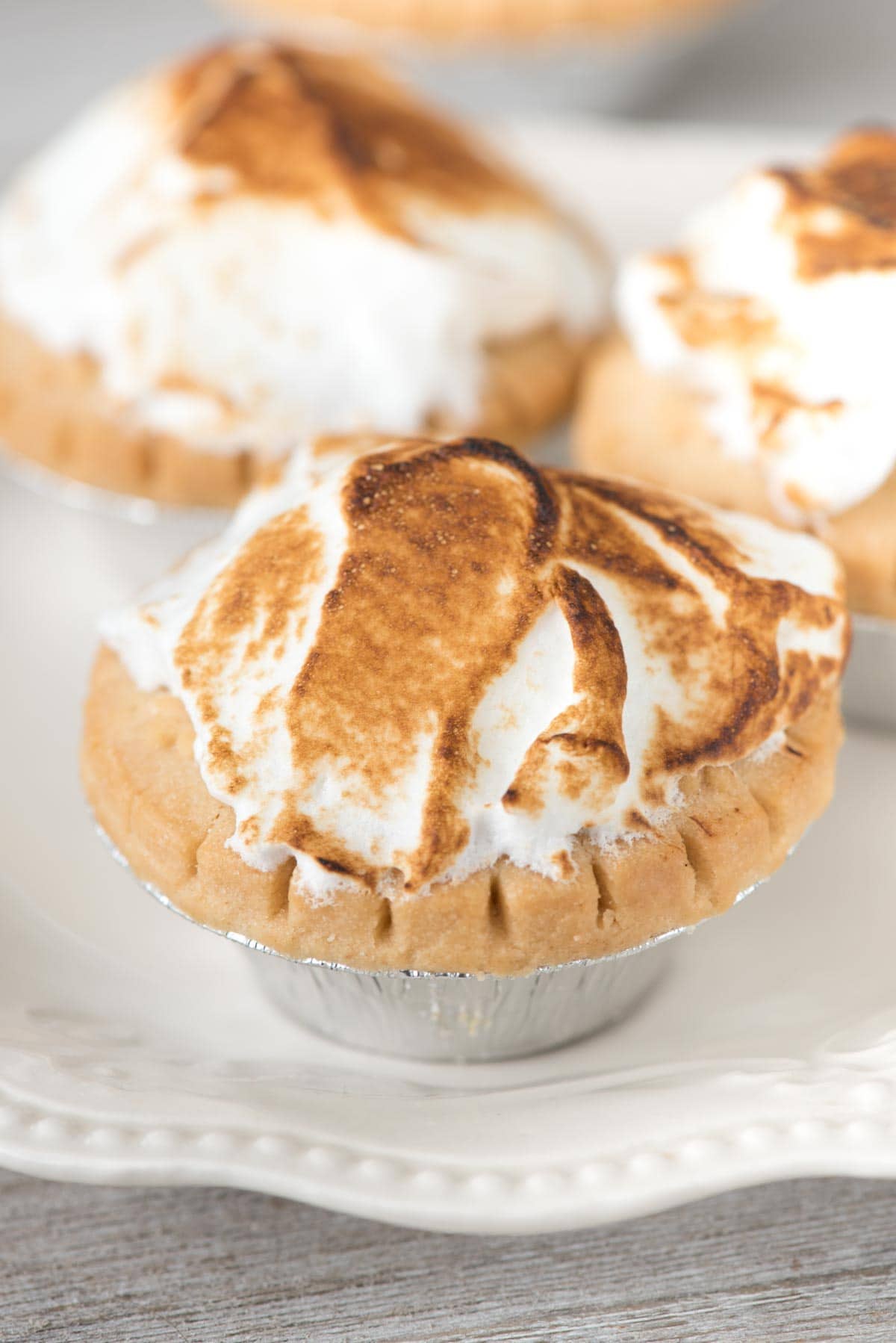 Easy Marshmallow Meringue Frosting - this meringue tastes like a melted marshmallow and is the perfect way to dress up pies, cupcakes, and brownies!
