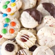 Soft chewy shortbread cookies are made from one shortbread recipe, with 4 cookie recipe variations. Add M&Ms, dip them in chocolate, or make shortbread thumbprint cookies!