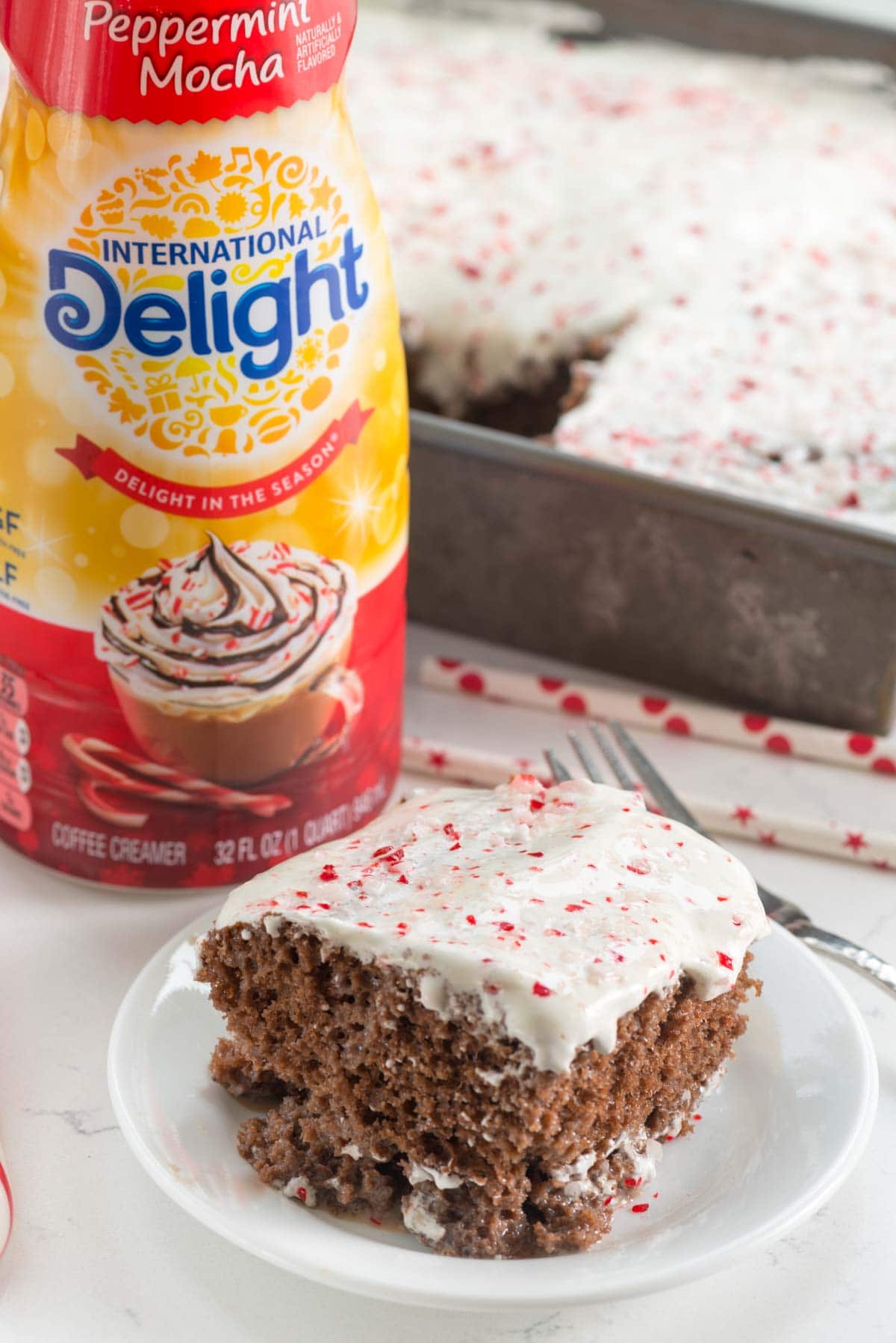 Peppermint Mocha Tres Leches Cake - this easy cake recipe is soaked with chocolate milk and full of peppermint mocha flavor!