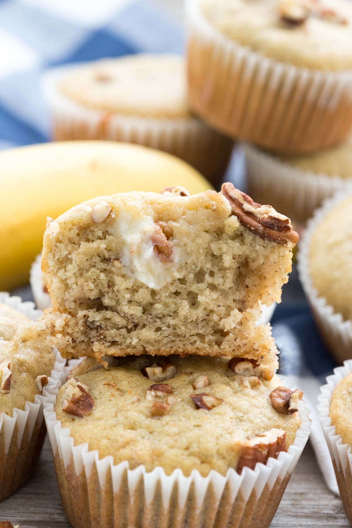 Cream Cheese Banana Muffins - this EASY banana muffin recipe is my favorite and it's FULL of a sweet cream cheese mixture! Everyone loves these muffins!
