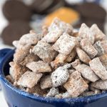 blue bowl with muddy buddies and oreo pieces