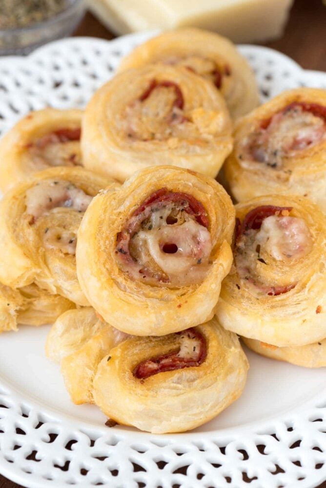 Stacked Pepperoni Pinwheels on a white plate