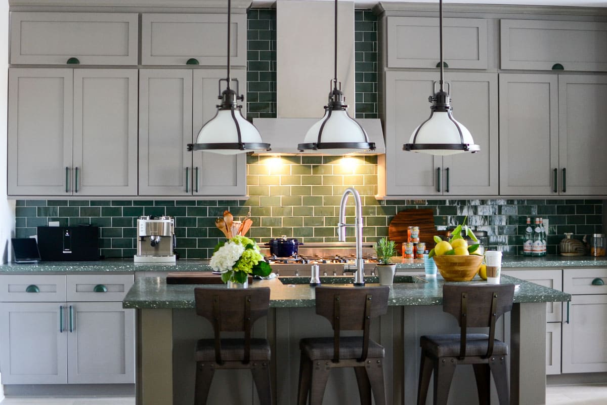 7 Tips for decorating a GREEN kitchen: - off white or light gray cabinets offset the richness of the green.