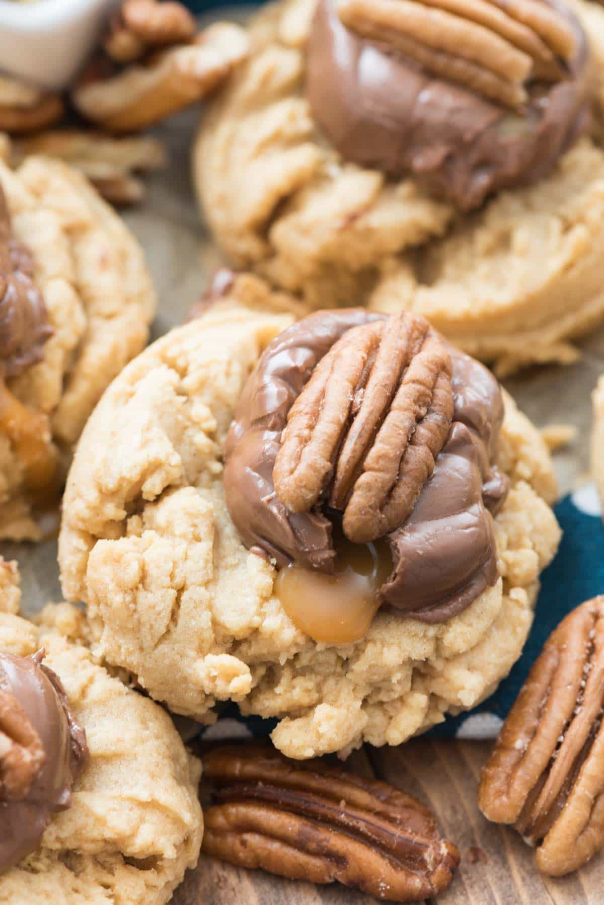 EASY Turtle Peanut Butter Cookies - this is my FAVORITE peanut butter cookie recipe topped with a caramel candy and a pecan. The easiest way to dress up a peanut butter cookie!