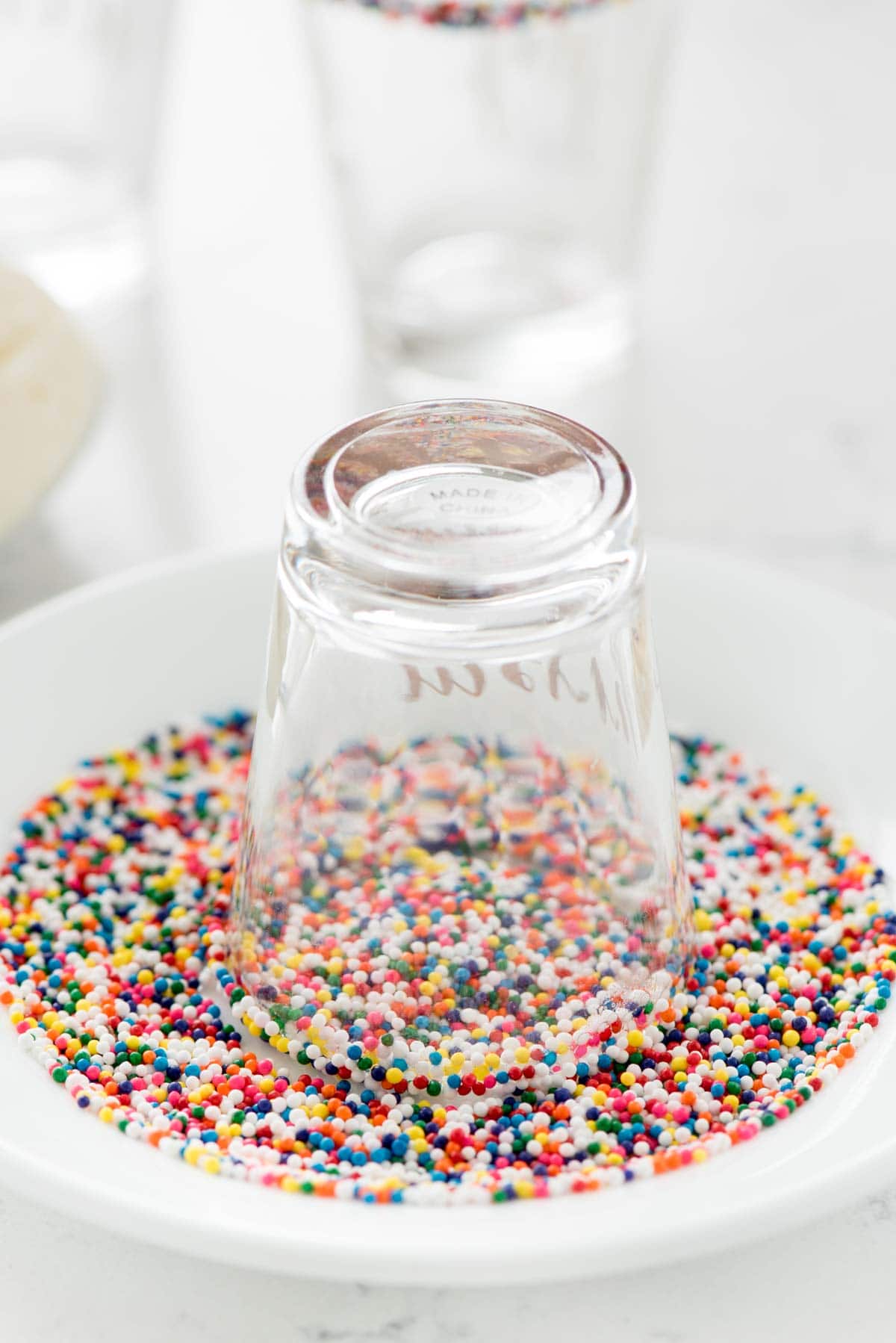 Rimming a Shot Glass with Colorful Sprinkles