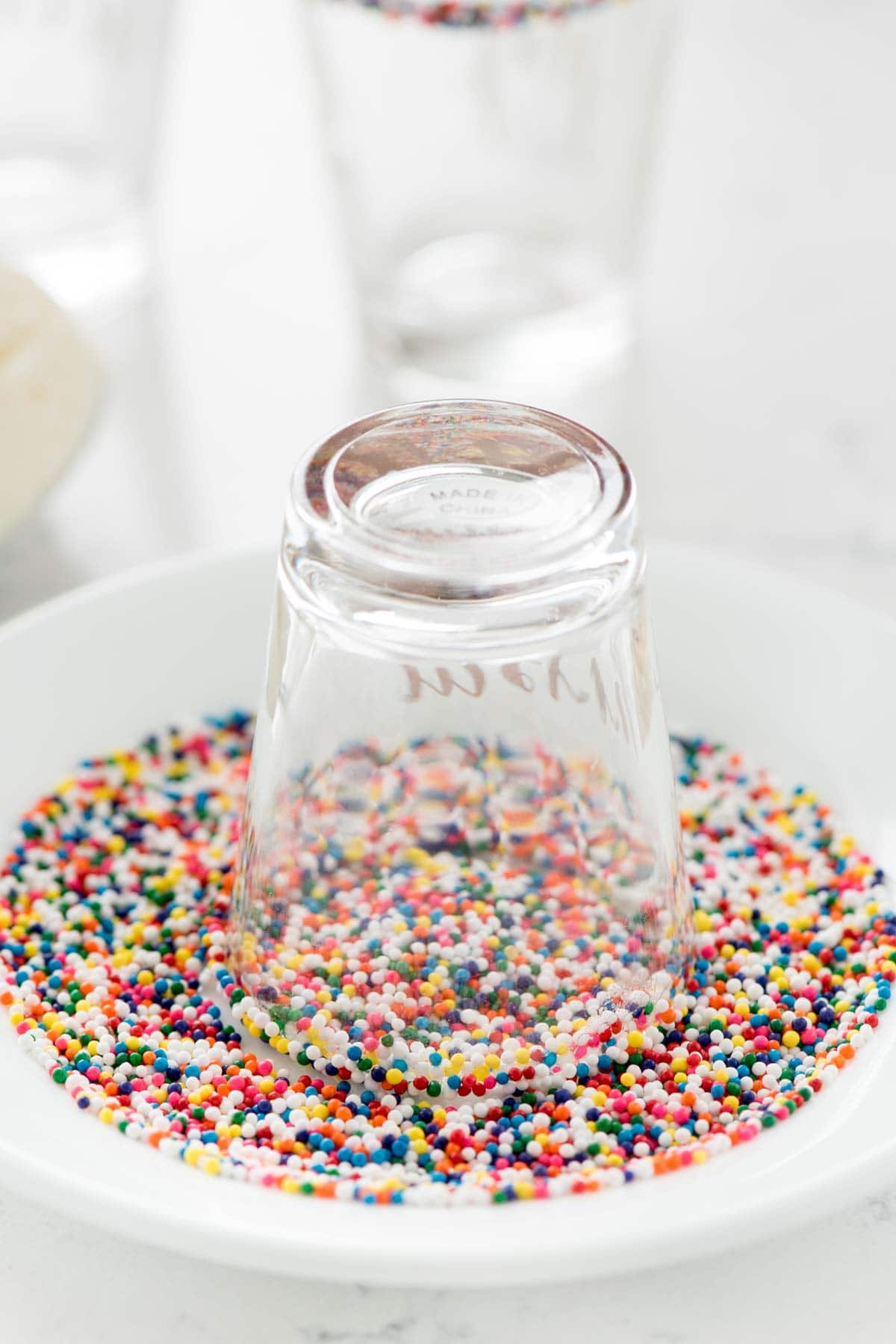 Rimming a Shot Glass with Colorful Sprinkles