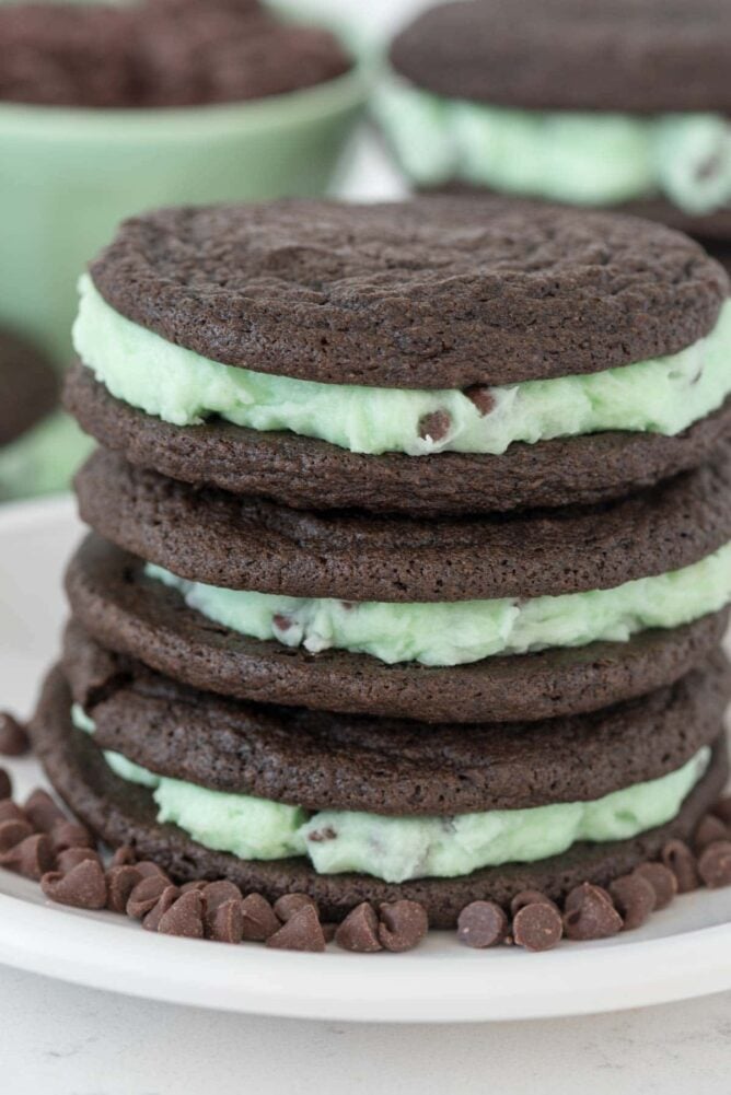 Homemade Mint Chip Oreos on a white plate stacked