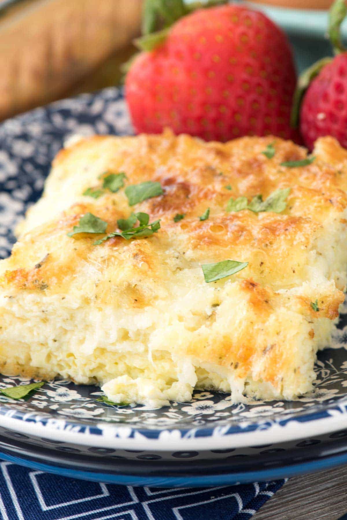 Buttery Cheesy Egg Casserole - this recipe is the perfect baked eggs recipe for brunch! It's full of cheese and spices and everyone loves it.