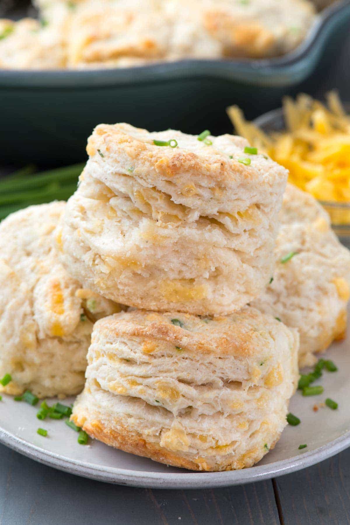 Cheddar Chive Biscuits - this easy buttermilk biscuit recipe is FULL of cheddar cheese and chives! Look at all those layers!