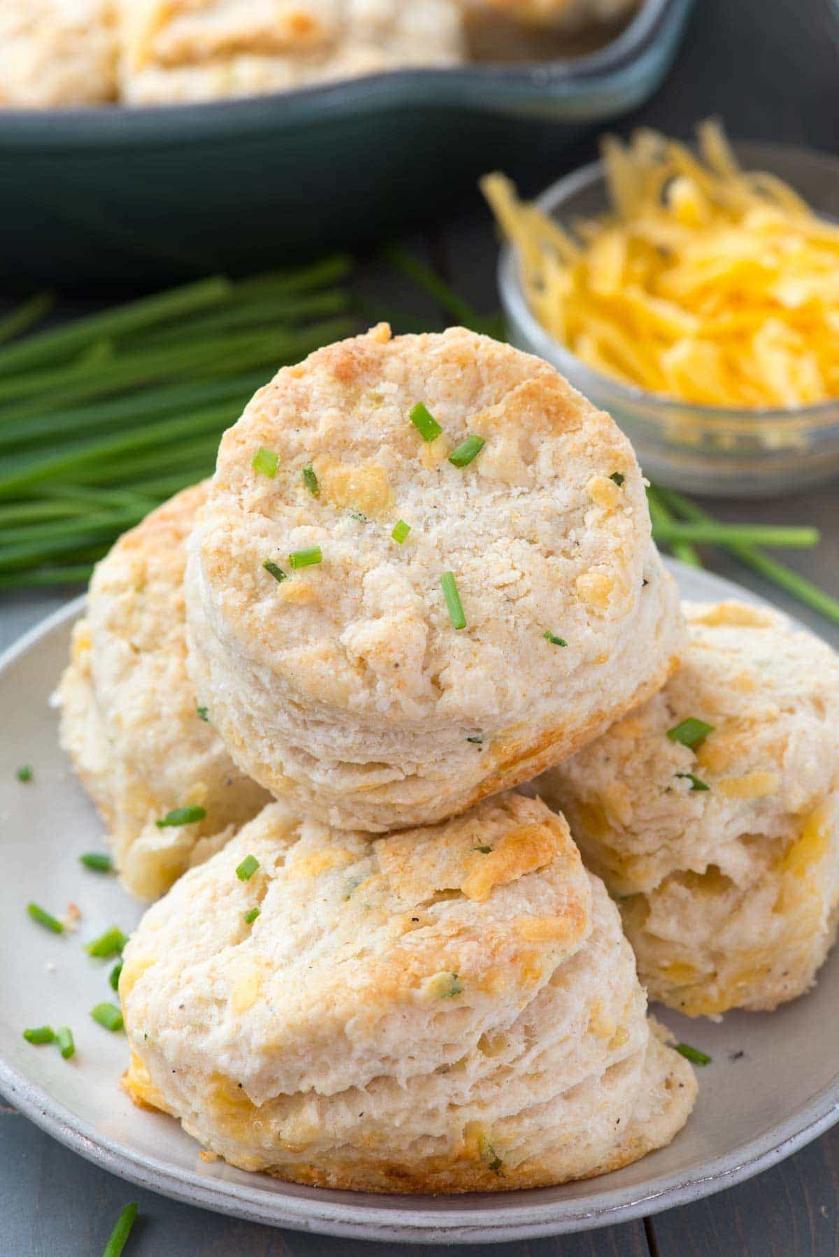 Cheddar Chive Biscuits - this easy buttermilk biscuit recipe is FULL of cheddar cheese and chives! Everyone loved these!