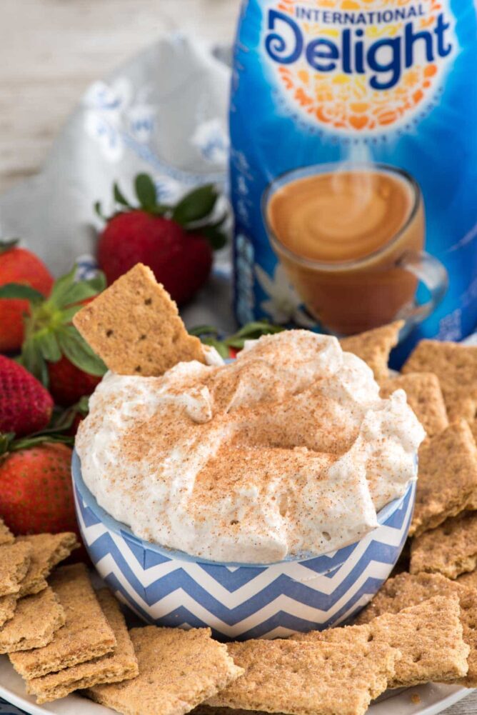 Churro Cheesecake Cip in a bowl with graham crackers to dip