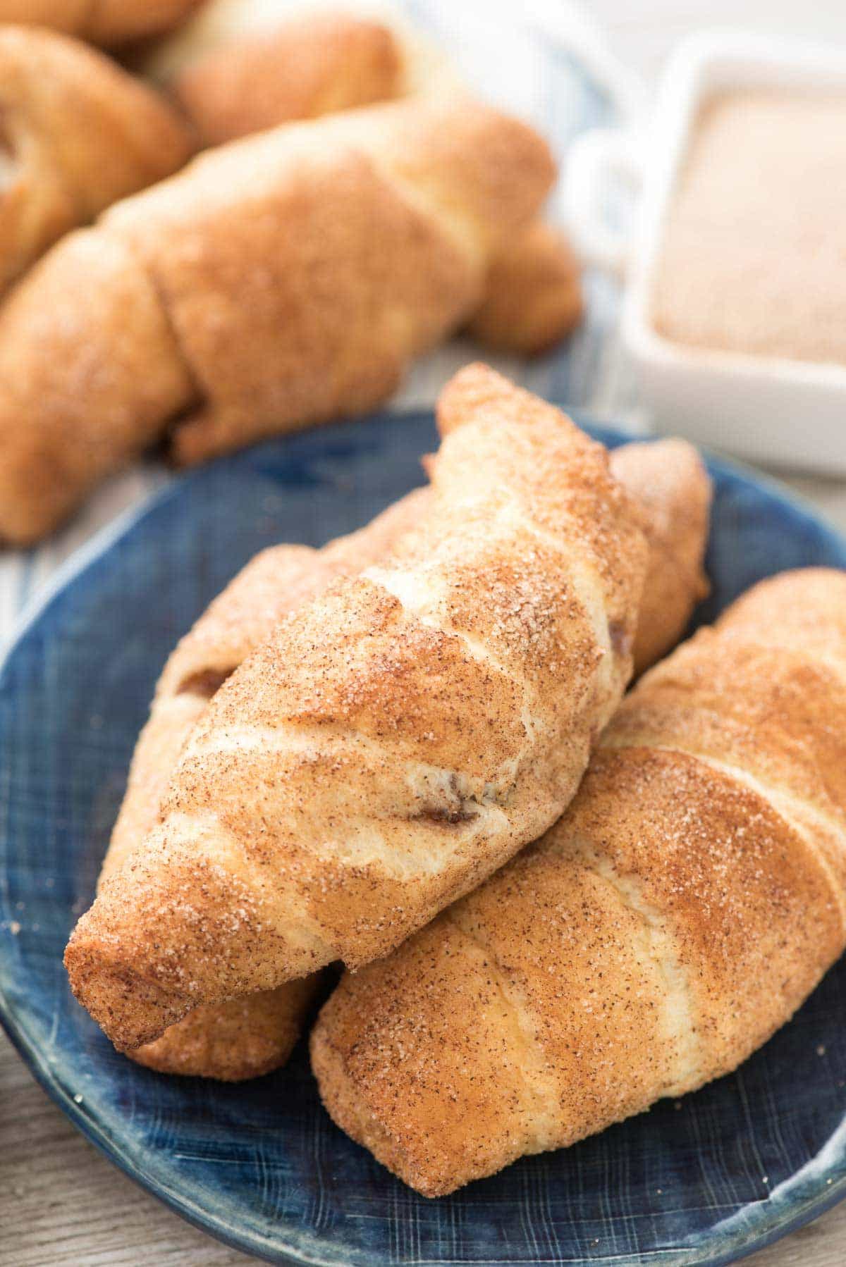 Crescent Roll Churros - this EASY baked churro recipe is crunchy and sweet and full of cinnamon flavor. Only 3 ingredients and are the perfect breakfast, brunch, or dessert recipe!