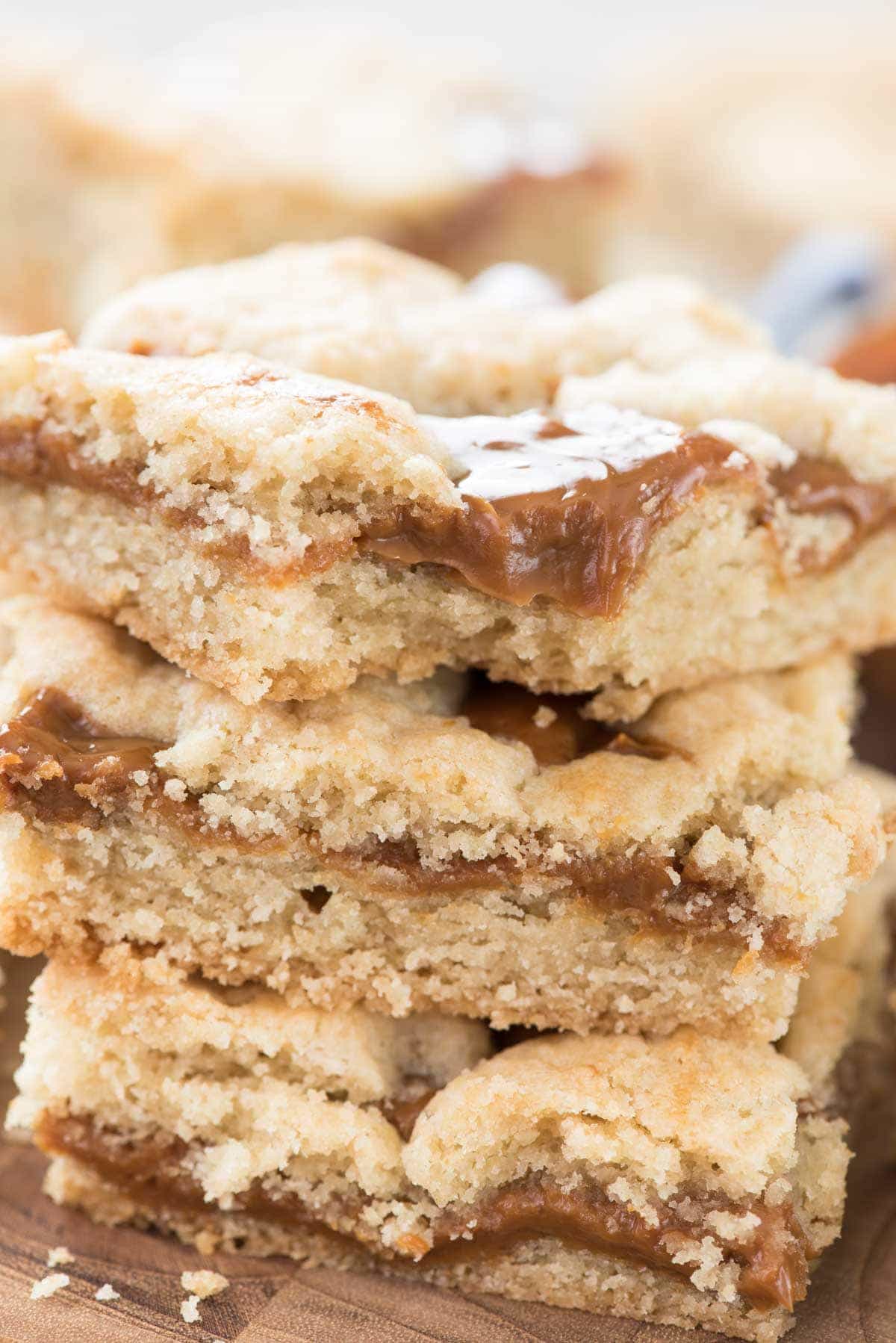 Dulce de Leche Gooey Bars - this EASY sugar cookie bar recipe has gooey dulce de leche inside! Cookie bars with caramel are always a hit!