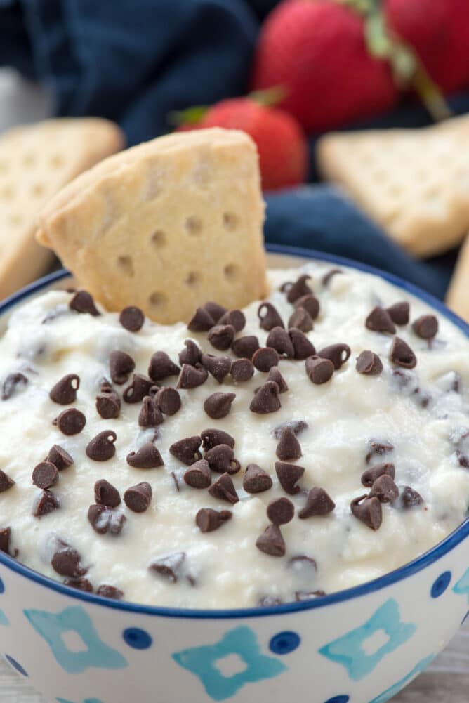 bowl of dip with chocolate chips and shortbread