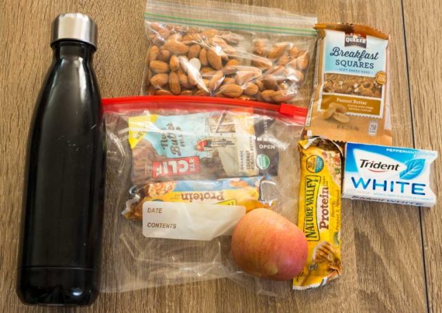 Carry On Essentials - water and snacks!