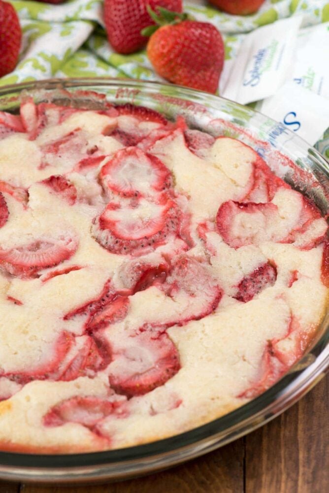 Easy Strawberry Cobbler in pan - a simple cobbler recipe that combines fresh fruit with a delicious batter on top!