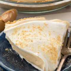 No Bake Peanut Butter Pie on a dark plate with a fork