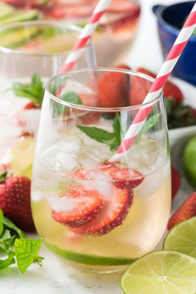 Strawberry Lime Party Punch - this easy cocktail recipe has just 3 ingredients: strawberry vodka, lemon lime soda, and seltzer. The perfect refreshing party punch cocktail!