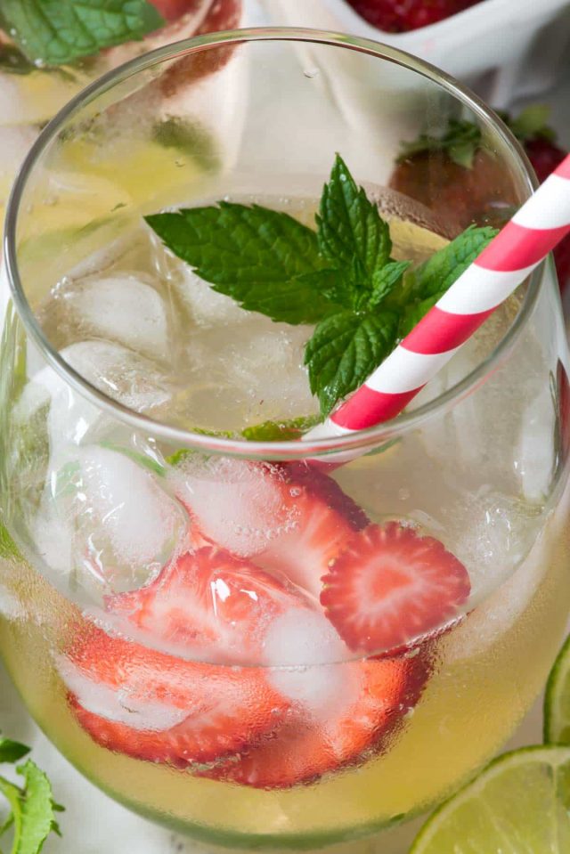 Strawberry Lime Party Punch - this easy cocktail recipe has just 3 ingredients: strawberry vodka, lemon lime soda, and seltzer. The perfect refreshing party punch cocktail!