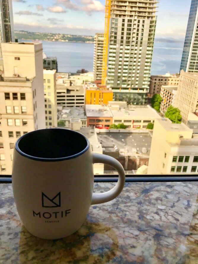 cup of coffee on windows from  Motif Hotel 