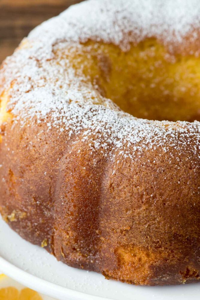 closeup of lemon butter cake with powdered sugar