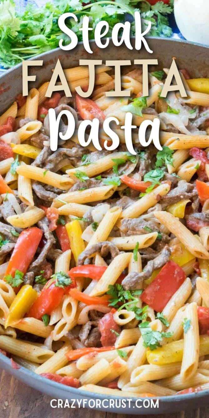 pan of pasta and steak and peppers