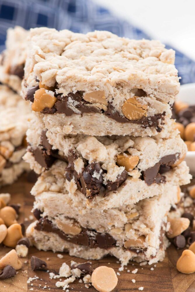 Magic Crumble Bars in a stack with chocolate and butterscotch