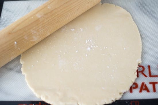 Dough being rolled out on a silpat