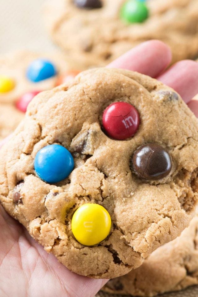 Peanut Butter M and M cookie in a persons hand
