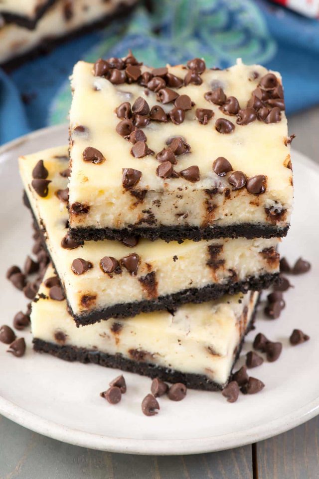 The BEST Chocolate Chip Cheesecake Bars - this is the best cheesecake bar recipe ever! It's smooth and silky and has an easy Oreo crust!