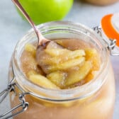 jar of apple pie filling with spoon