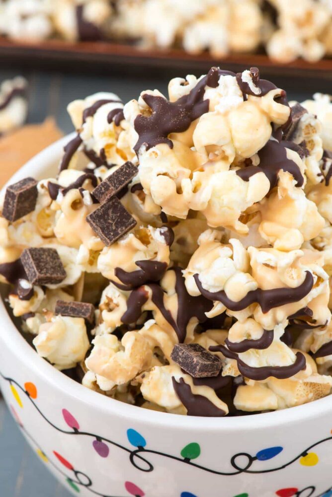 Chocolate Peanut Butter Popcorn is an easy snack or dessert that's perfect for gifting! Just 4 simple ingredients for a delicious holiday treat.