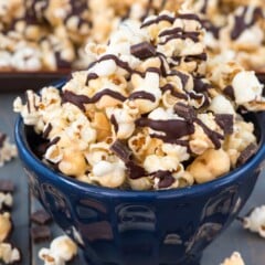 Chocolate Peanut Butter Popcorn is an easy 4 ingredient popcorn recipe that is perfect for dessert or movie night, or for gifting!