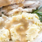 These simple and Easy Crockpot Mashed Potatoes come together in minutes - you set it and forget it so you can make all the other sides! It's crazy how good they are from the slow cooker!