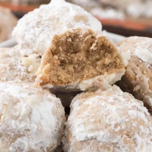 Gingerbread Snowballs are an easy Christmas cookie that combines the best of both family favorite recipes!