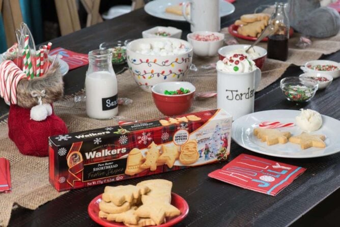 Table set up with Walkers Shortbread cookies and all ingredients to decorate the cookies