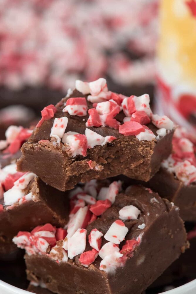 Stack of Peppermint Mocha Fudge and one has a bite out of it