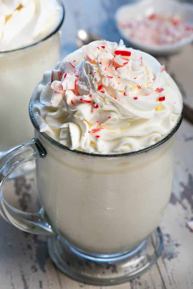 Spiked Peppermint White Hot Chocolate in a glass mug