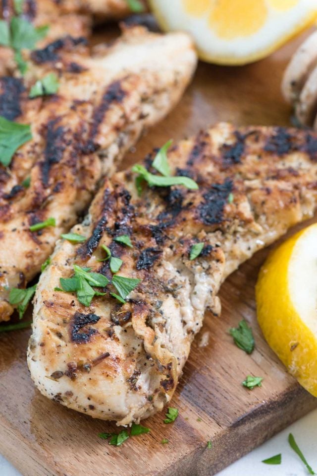Grilled Lemon Herb Chicken - this delicious and easy chicken marinade recipe is perfect for dinner and is only a 30 minute meal!