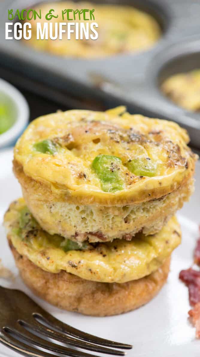 stack of egg muffins on a white plate with a fork