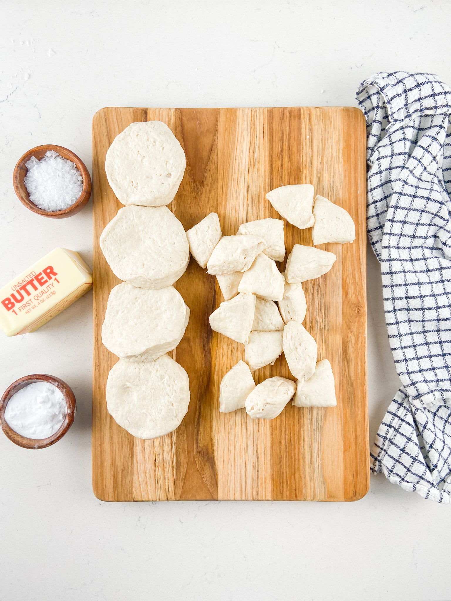 biscuits and cut biscuit dough on cutting board