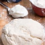 pizza dough on cutting board