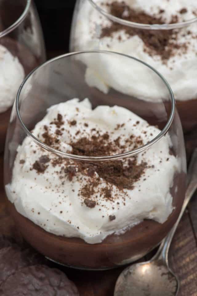 close up of baileys pudding pies in wine glass