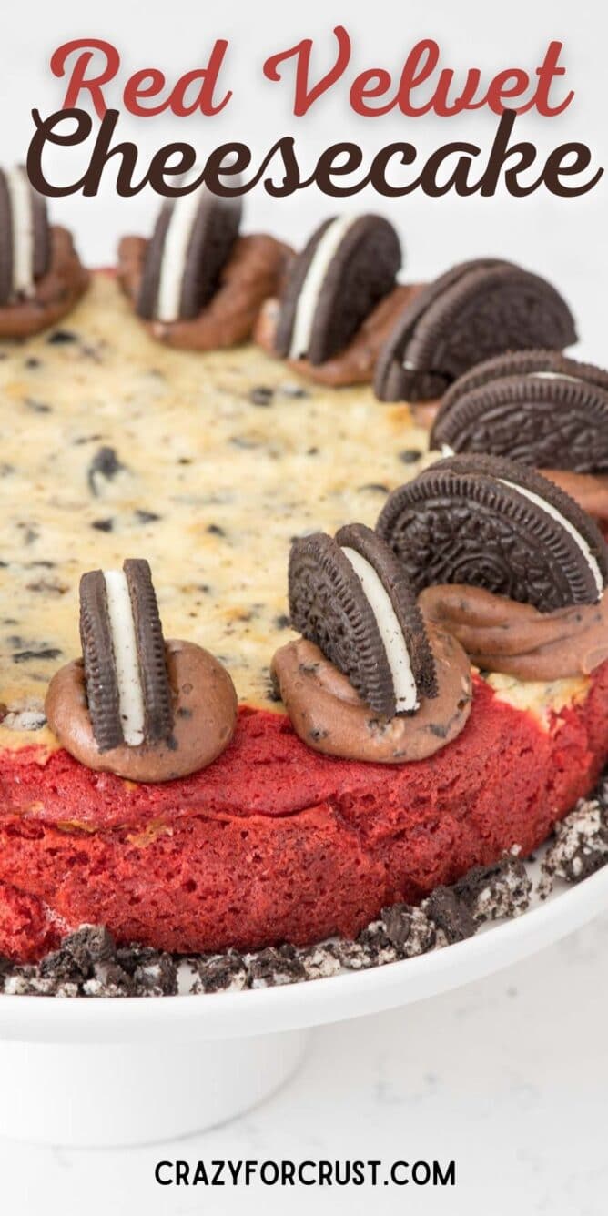 cheesecake cake with Oreos on white cake plate